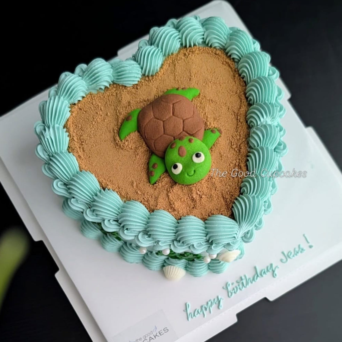 Heart cake with a cute sculpted turtle cookie on a chocolate bark base, healthy low-sugar birthday cake Singapore