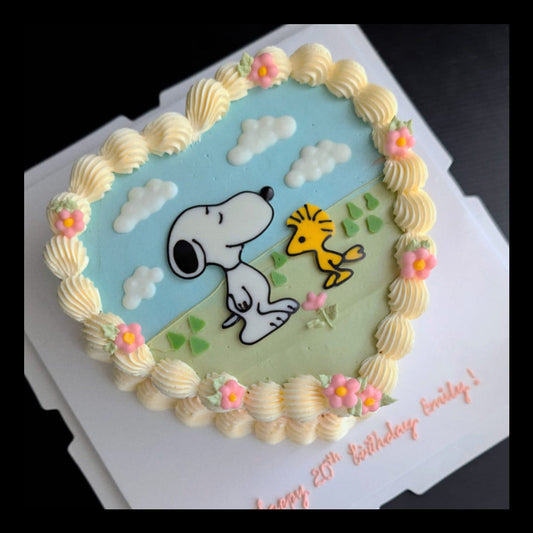 Heart-shaped cartoon-inspired cake topped with hand-piped buttercream roses, healthy low-calorie floral birthday cake