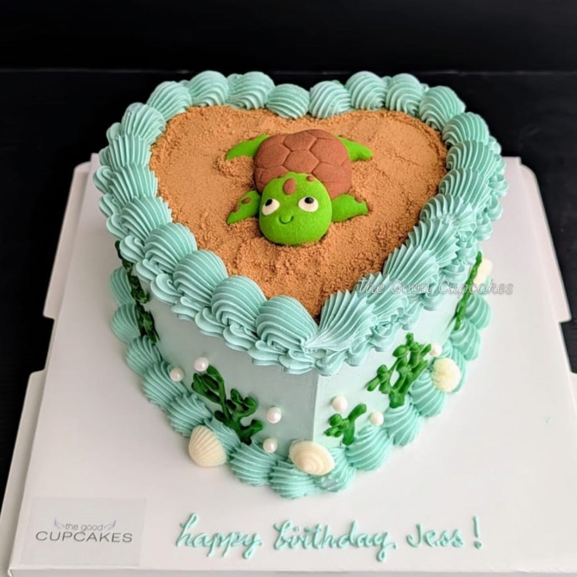 heart cake with a cute sculpted turtle cookie on a chocolate bark base, healthy low-sugar birthday cake