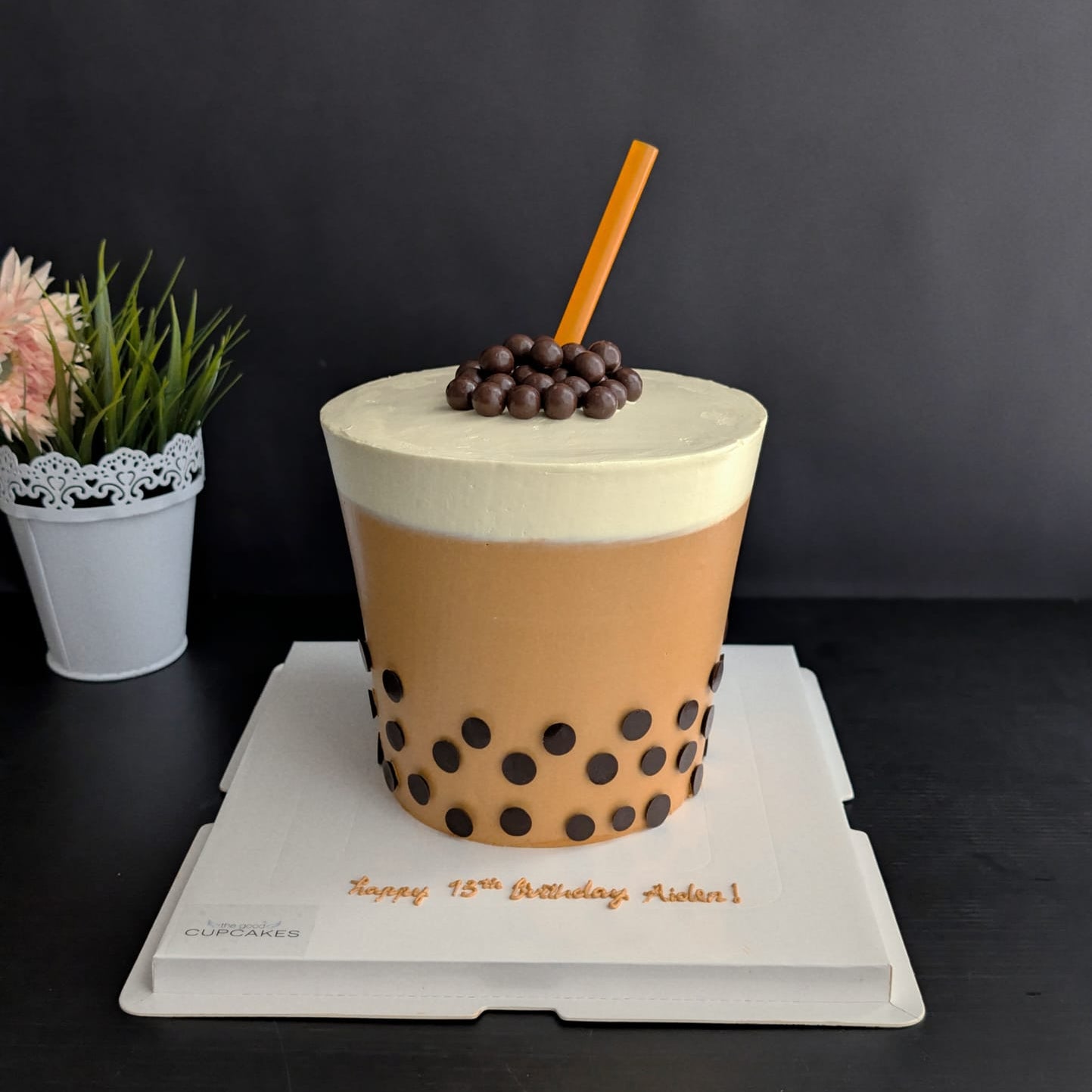 Bubble tea boba cake with caramel brown buttercream, chocolate pearl topping and straw, novelty birthday cake Singapore