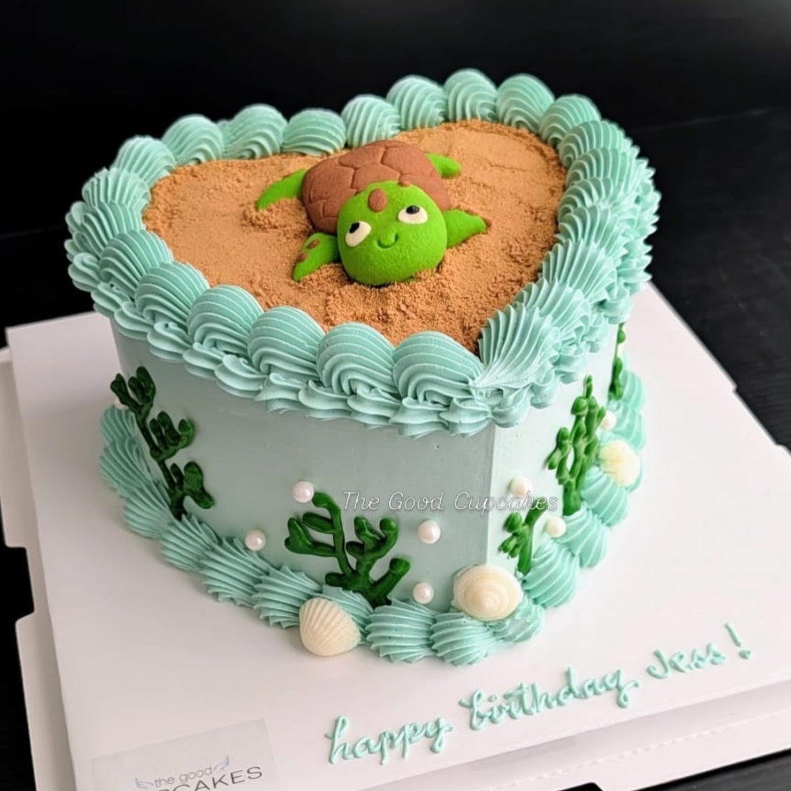 heart cake with a cute sculpted turtle cookie on a chocolate bark base, healthy low-sugar birthday cake