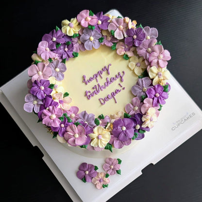 Wreath floral cake with hand-piped pink, white and blue buttercream roses, healthy low-sugar birthday cake Singapore