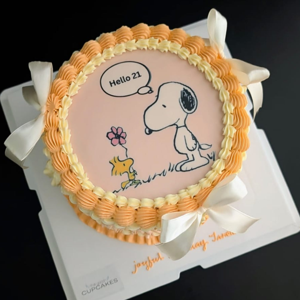 Round vintage cartoon-inspired cake topped with hand-piped buttercream roses, healthy low-calorie floral birthday cake