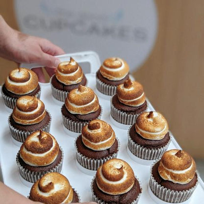 Tray of s'mores cupcakes with swirled toasted marshmallow frosting on chocolate base, set of 6 available