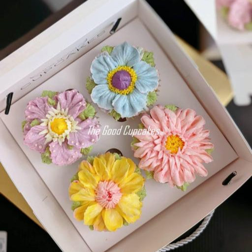 Box of 4 hand-piped floral buttercream cupcakes in assorted designs, 150 calories each, The Good Cupcakes Singapore
