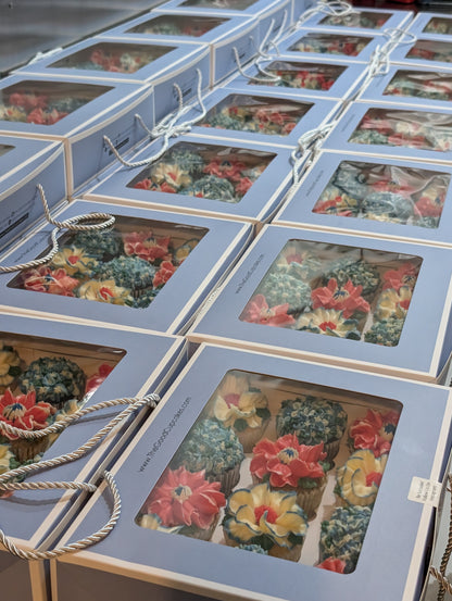 Bulk floral cupcake gift boxes for corporate events, hand-piped buttercream flowers, 150 calories each, The Good Cupcakes Singapore