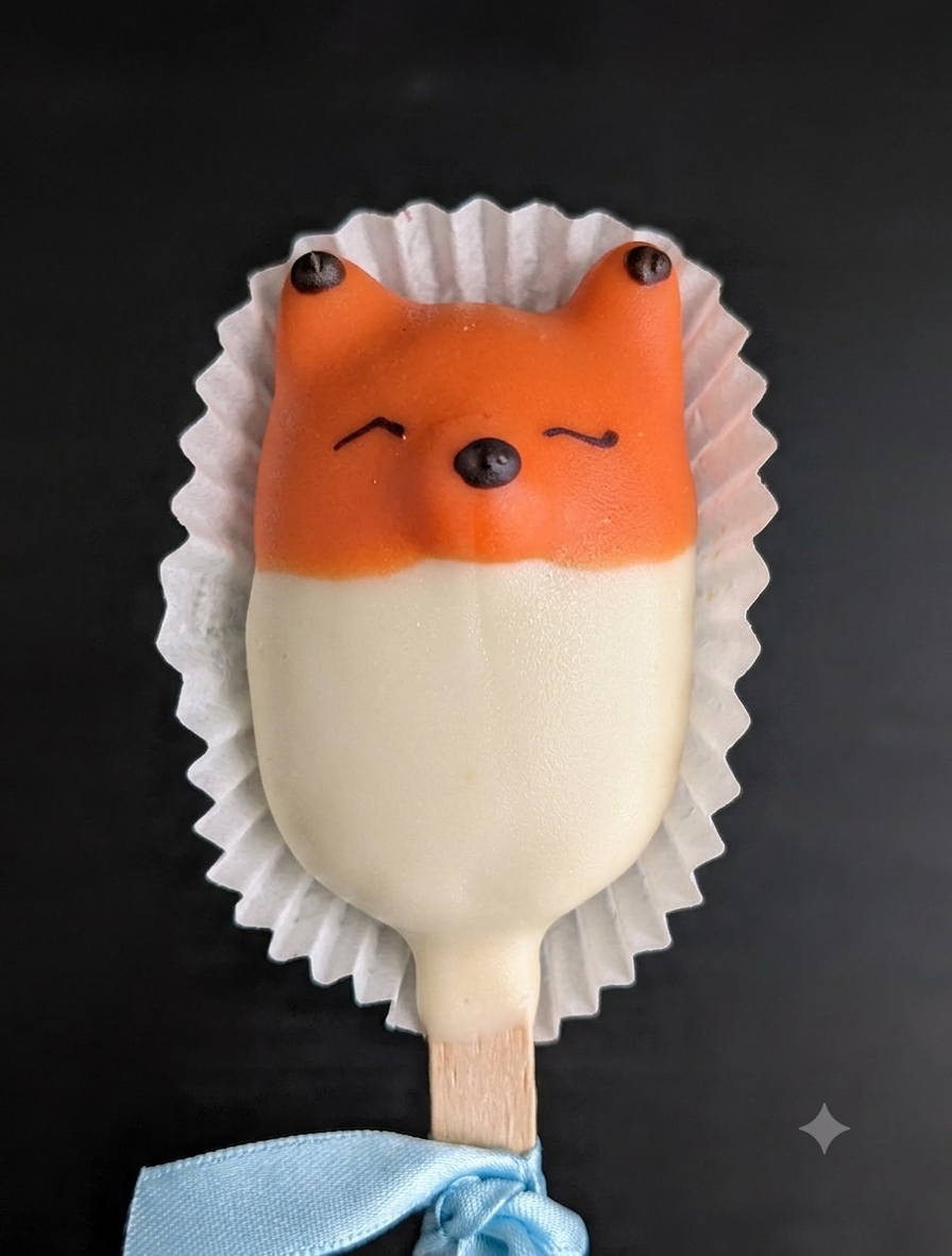 Fox cakesicle — brownish red and white cute fox in cake