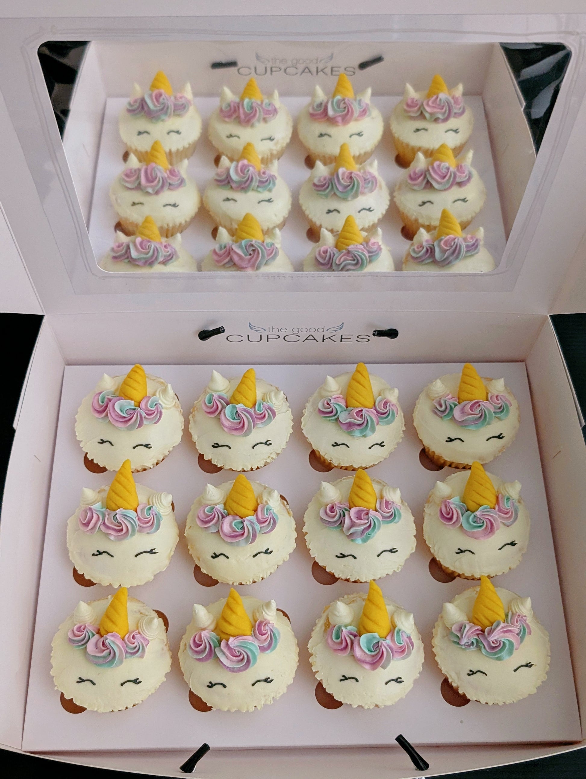 Box of Rainbow Unicorn cupcakes packaged for gifting, custom hand-piped buttercream design — The Good Cupcakes Singapore