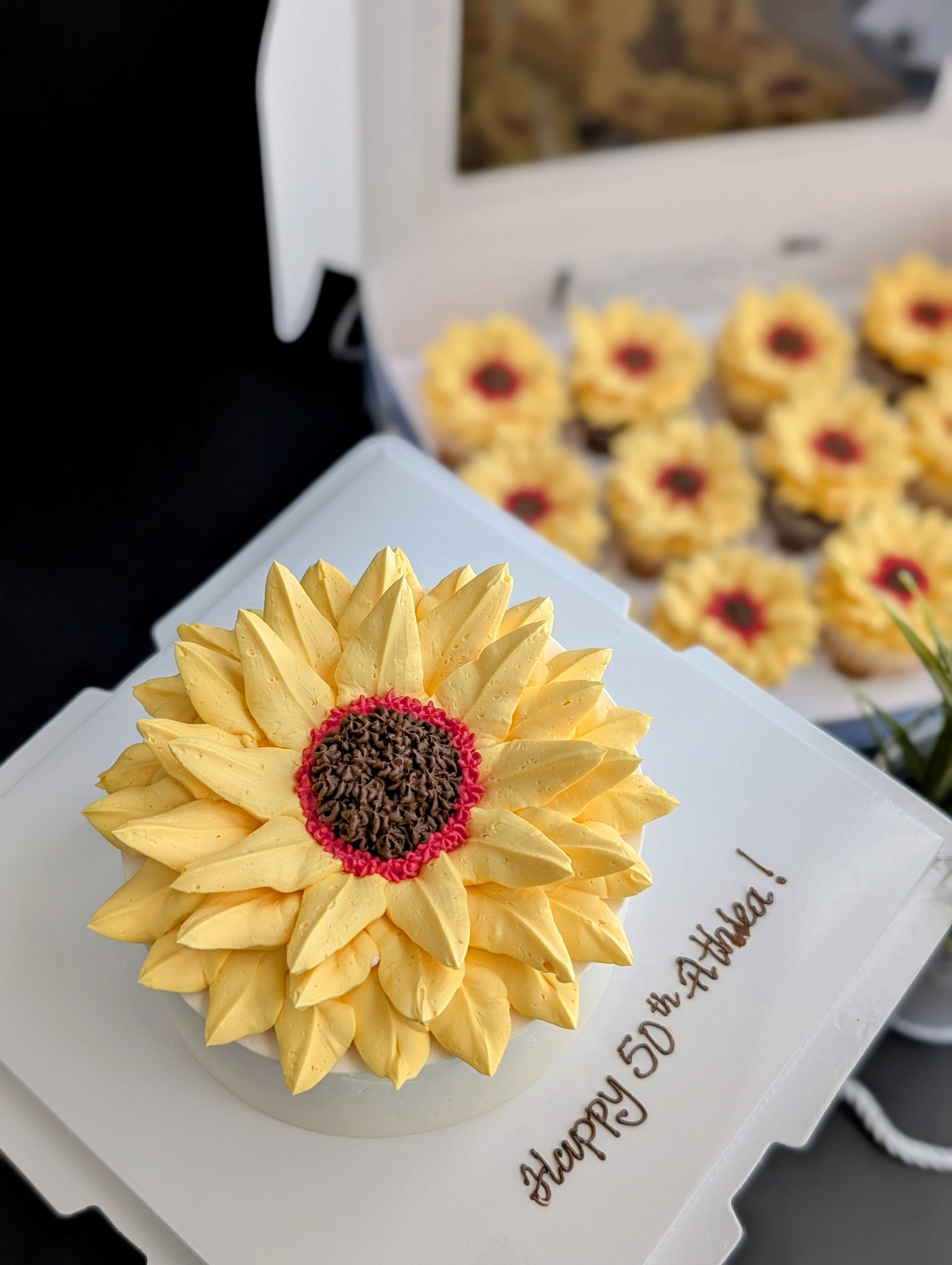 Sunflower cake with hand-piped yellow buttercream petals and chocolate centre, healthy low-sugar birthday cake Singapore