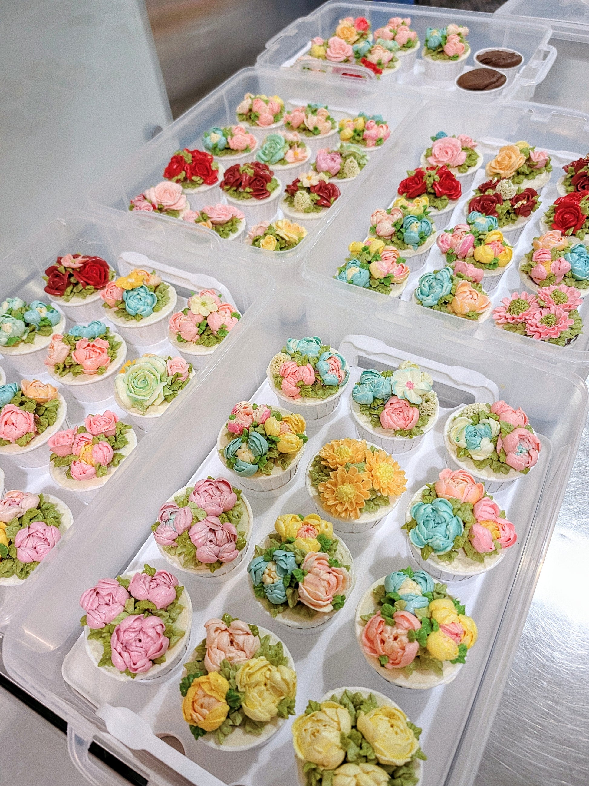 Bulk floral cupcake gift boxes for corporate events, hand-piped buttercream flowers, 150 calories each, The Good Cupcakes Singapore