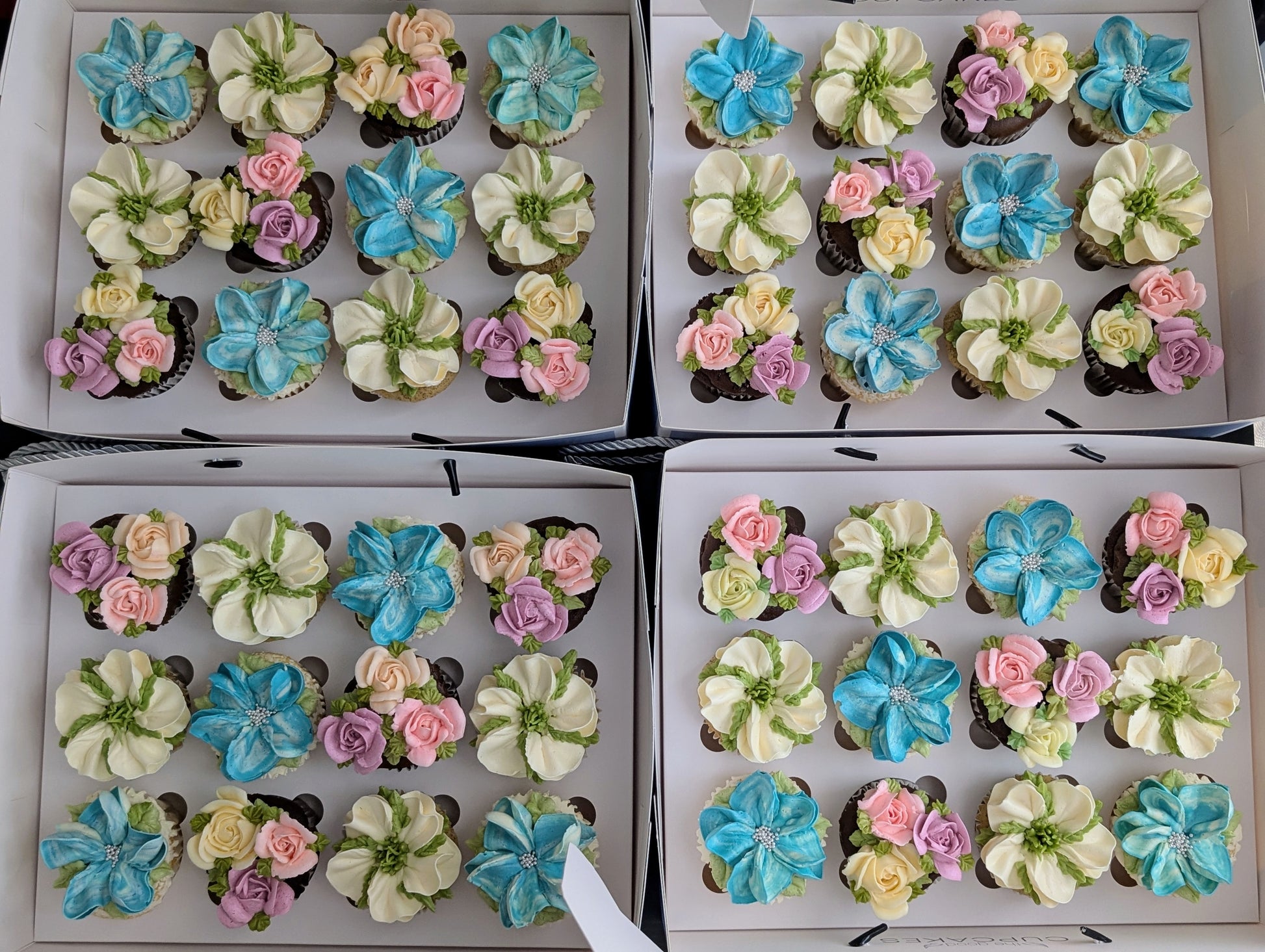 Bulk floral cupcake gift boxes for corporate events, hand-piped buttercream flowers, 150 calories each, The Good Cupcakes Singapore