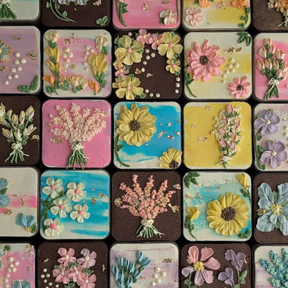 Floral bento boxed cakes with hand-piped buttercream flowers on pastel painted backgrounds, healthy low-sugar mini cakes Singapore