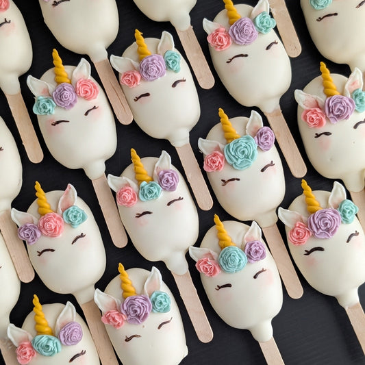 Unicorn cakesicles - cutest white  unicorn cakesicles with colourful flowers and handpainted details
