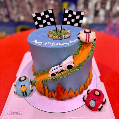 Car-themed birthday cake with baby blue buttercream, toy racing cars and road details, low calorie, no fondant
