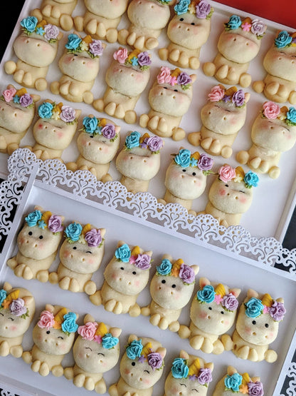 Rainbow Unicorn shortbread cookies arranged in rows on a display tray, hand-painted low sugar cookies — The Good Cupcakes Singapore