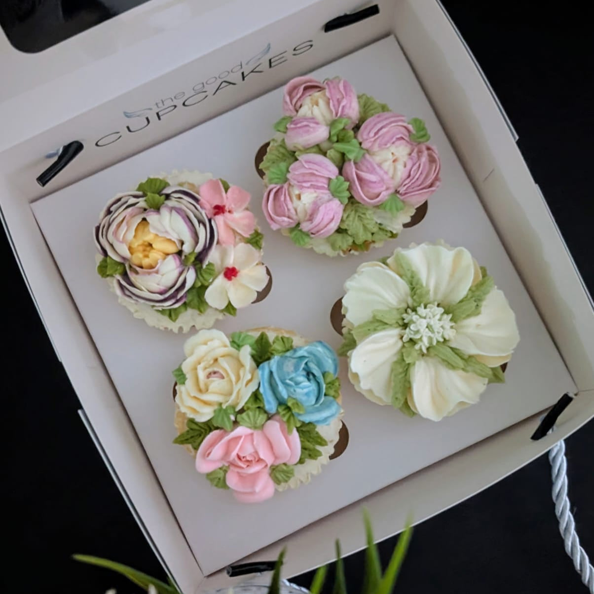 Box of 4 hand-piped floral buttercream cupcakes in assorted designs, 150 calories each, The Good Cupcakes Singapore