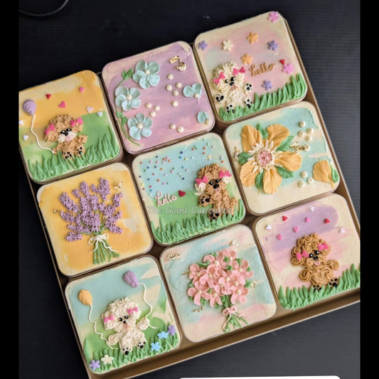 Floral bento boxed cakes with hand-piped buttercream flowers on pastel painted backgrounds, healthy low-sugar mini cakes Singapore