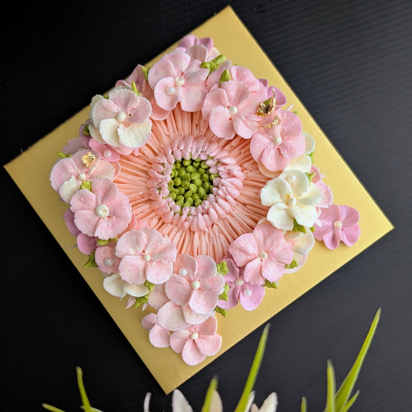 round-shaped floral cake with hand-piped buttercream flowers, healthy low-sugar birthday cake Singapore