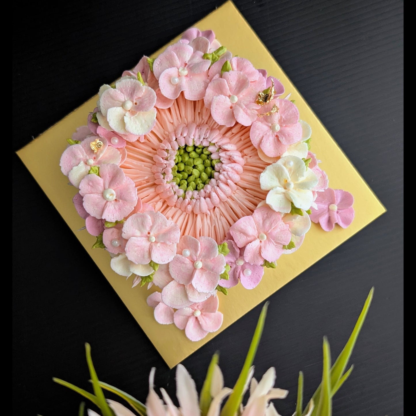 Round floral cake with hand-piped pink, white buttercream flowers, healthy low-sugar birthday cake Singapore