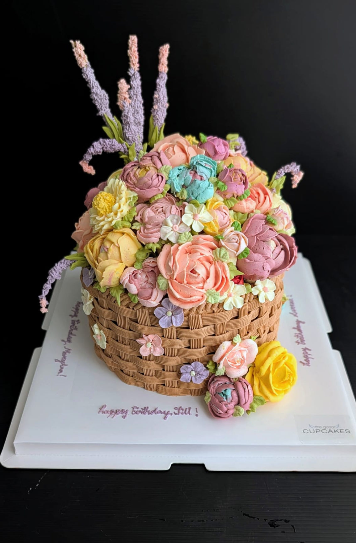 Floral basket cake with hand-piped buttercream peonies and lavender in wicker basket design, healthy low-sugar birthday cake Singapore