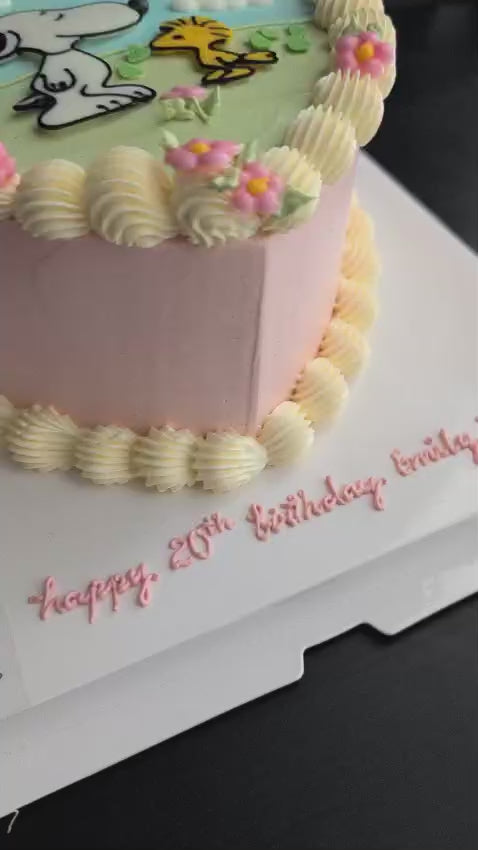 heart Snoopy cake topped with hand-piped buttercream roses, healthy low-calorie floral birthday cake