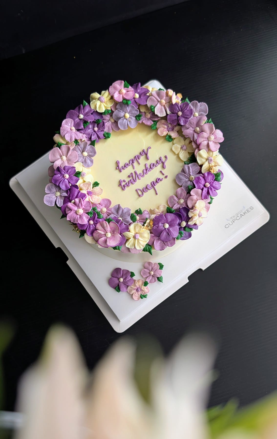 Wreath floral cake with hand-piped pink, white and blue buttercream roses, healthy low-sugar birthday cake Singapore